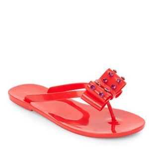 red jelly flip flops